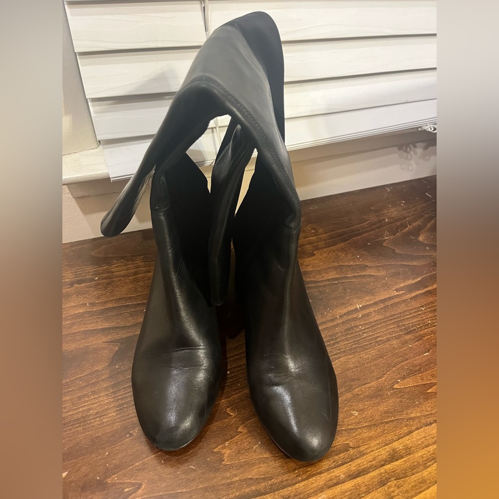 Steve madden knee high bootie- front leather, back elastic fabric